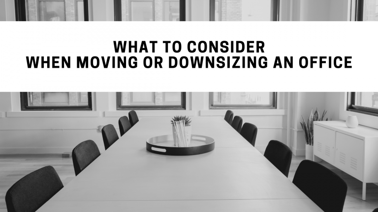 Conference table with chairs around it.